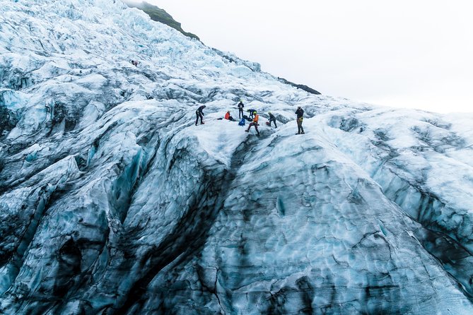 2-Day Ice Cave & South Coast: Glacier Hike and Glacier Lagoon - Skógafoss: power, spray, and a steep staircase