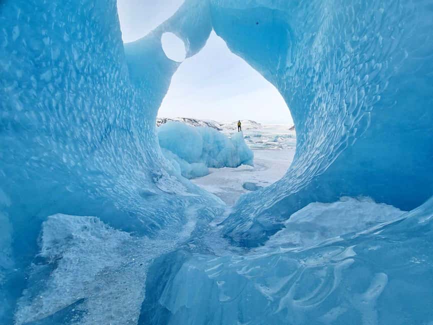 2-Day South Coast, Blue Ice Cave, Glacier Lagoon Tour - Entering a blue ice cave beneath Vatnajökull