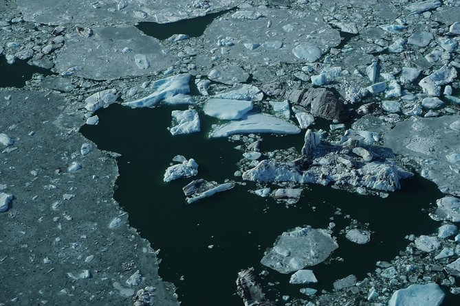 Airplane flight over glacier lagoons and Iceland's highest peak - Breiðamerkurjökull, Esjufjöll, and the great ice field
