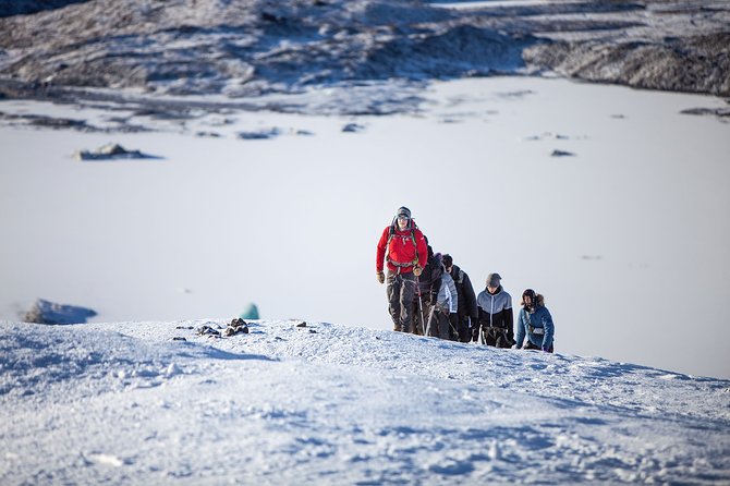 Crystal Treasures of Vatnajökull: Ice Cave Adventure - Walking from the bus to the ice cave