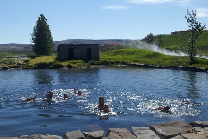 Fludir Secret Lagoon Admission Ticket Only - Entering Gamla Laugin and settling into the water