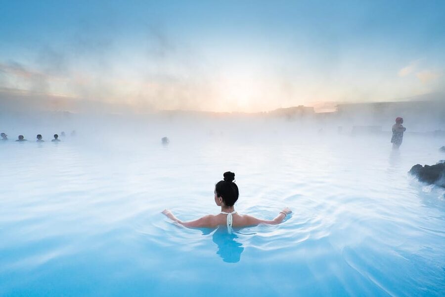 From Reykjavík: Blue Lagoon Premium Admission with Transfer - Entering the 8,700-square-meter lagoon