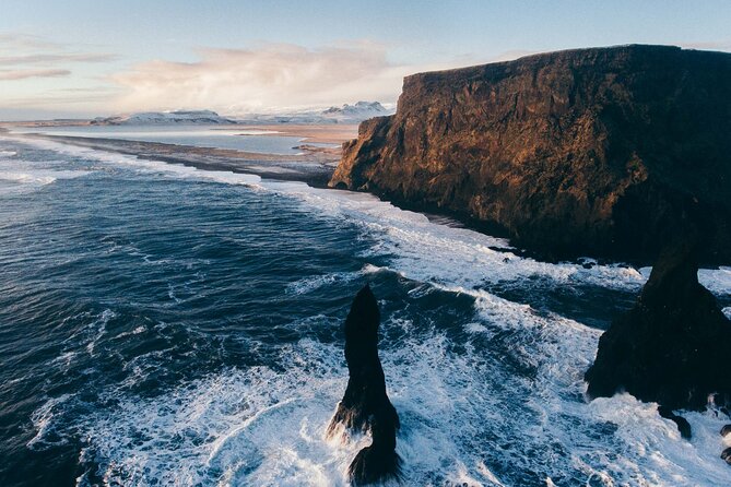 From Reykjavik: Glacier Hike, South Coast and Waterfalls Day Trip - Reynisfjara, black sand, basalt, and rough waves