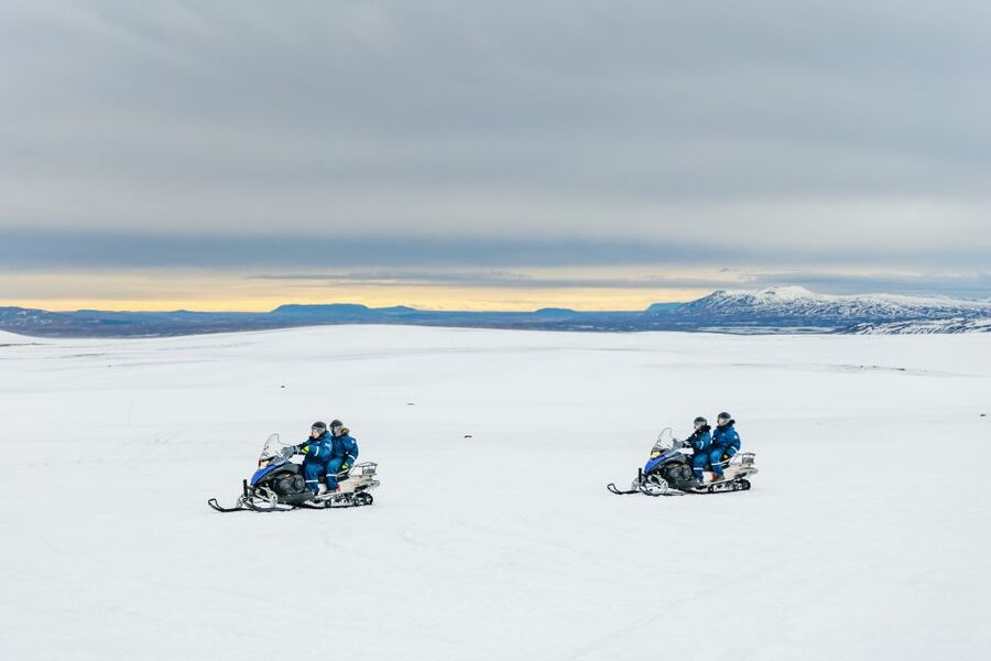From Reykjavik: Golden Circle and Glacier Snowmobile Tour - Leaving Reykjavík in a tablet-equipped bus