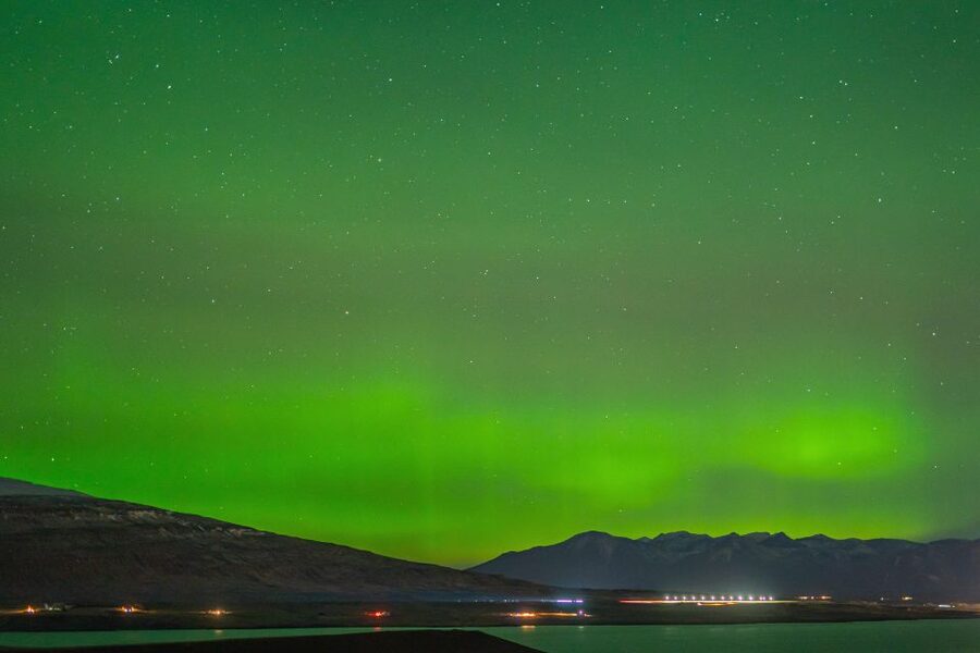 From Reykjavik: Northern Lights Guided Tour with Photos - Chasing the Aurora beyond Reykjavik’s city glow