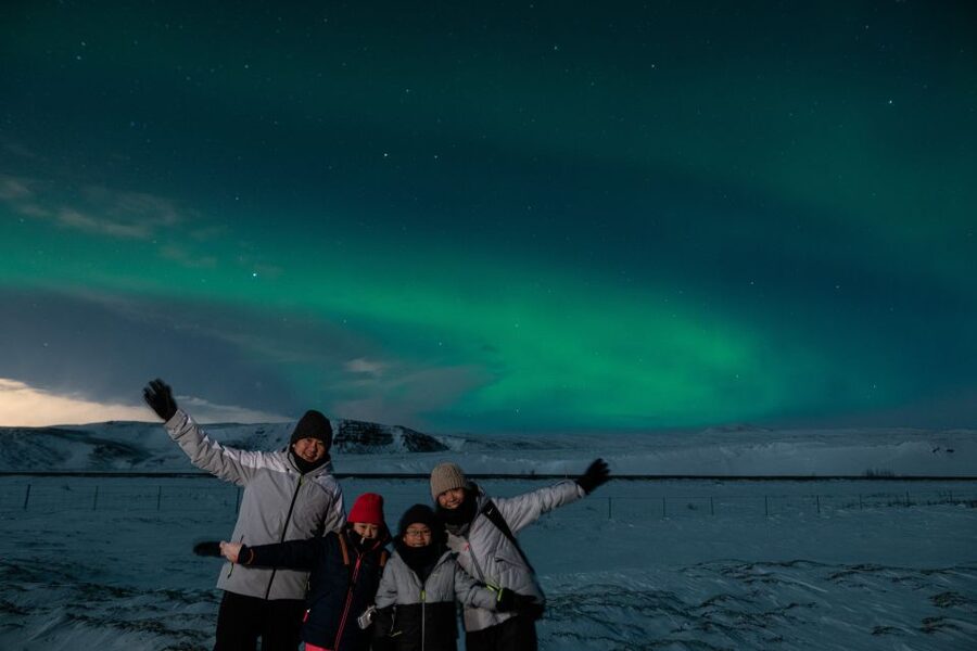 From Reykjavik: Northern Lights Guided Tour with Photos - Taking photos beneath the Northern Lights