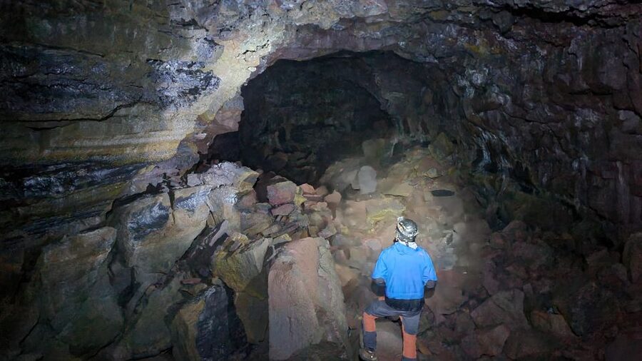Geological Lava Tunnel Adventure - Arnarker Cave - Lava shapes, ice, and the work of a geologist