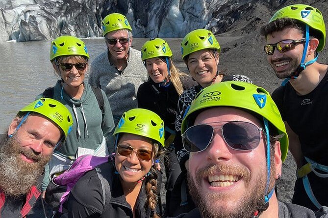 Glacier Hike Experience on Sólheimajökull - Meet on location - Getting ready with crampons, an ice pick, and a helmet