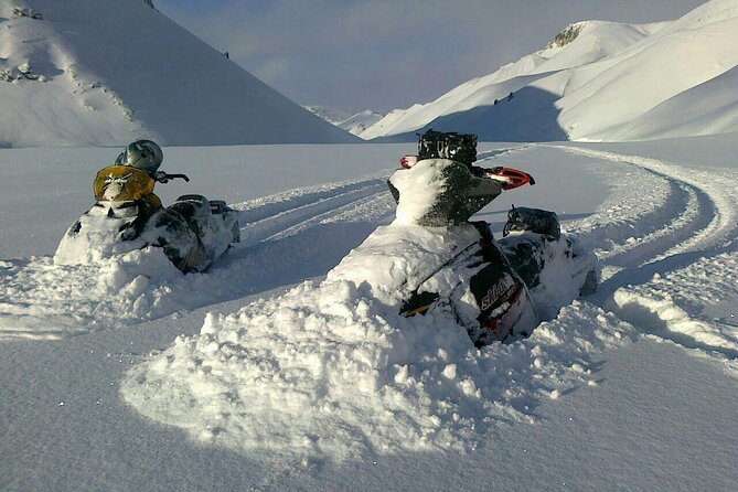 Golden Circle Super Jeep Adventure with Snowmobiling on Glacier - One hour on a snowmobile at Langjökull