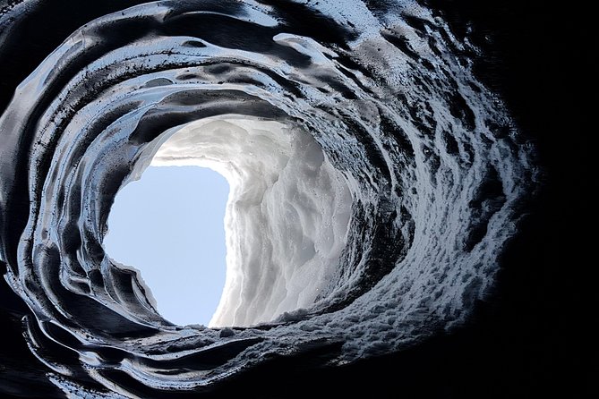 Ice Cave at Katla Volcano - Fire, ice, ash, and meltwater