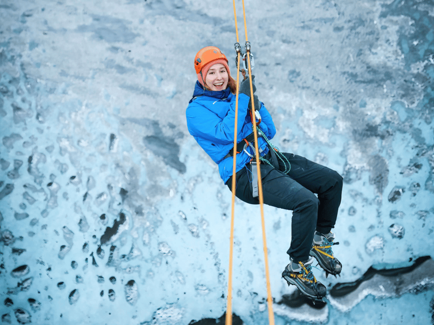 Iceland: Glacier Zip Line Tour with Hike or Ice Cave Visit - A glacier zipline above a blue moulin