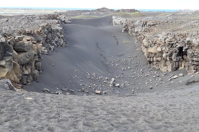 Lava, Craters and Hot Springs Private Tour - A quiet pause at Hvalsneskirkja
