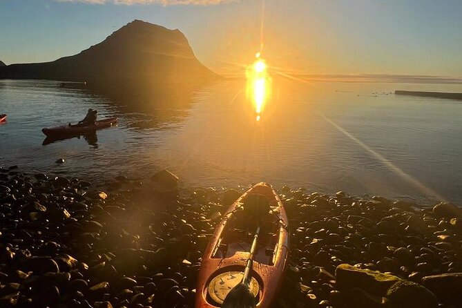Midnight Sun Kayaking Adventure by Mt. Kirkjufell - Paddling beside the mountain