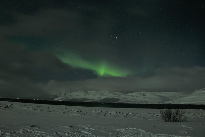 Northern Lights 4x4 Jeep/van Tour from Akureyri - Cocoa, doughnuts, and the cold-weather pause