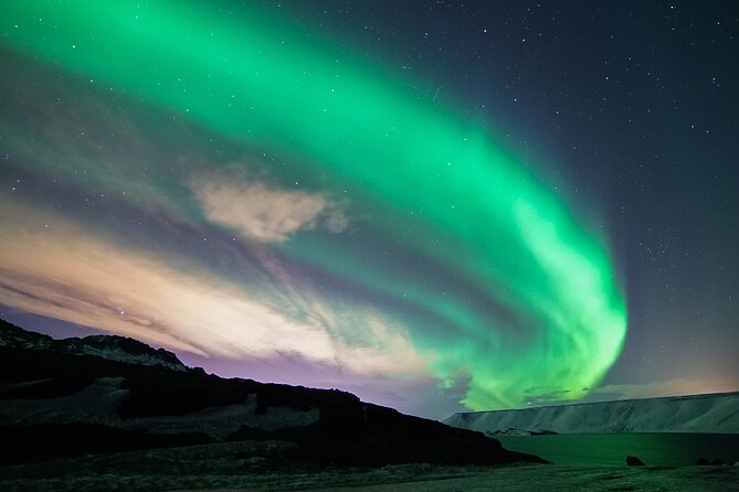 Northern Lights Minibus Tour with Hot Cocoa, Blankets & Photos - Hot cocoa, blankets, and the cold reality