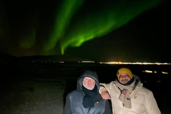 Northern Lights Private Guided Tour With Professional Photos - Waiting under Iceland’s dark sky