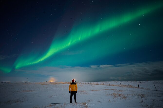 Northern Lights Tour with Photos, Snacks, Warm Snowsuits, Chairs - The limits of a Northern Lights promise
