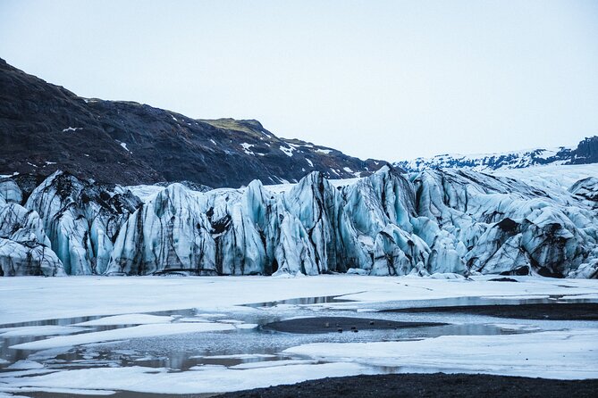 Private South Coast with Glacier Hike in Iceland - Reynisfjara Beach: black sand and caution