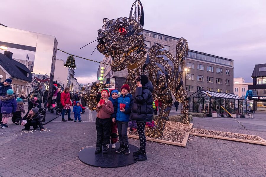 Reykjavik: Christmas Walking Tour with Icelandic Traditions - Ingólfur Square: lights, skating, and market stalls