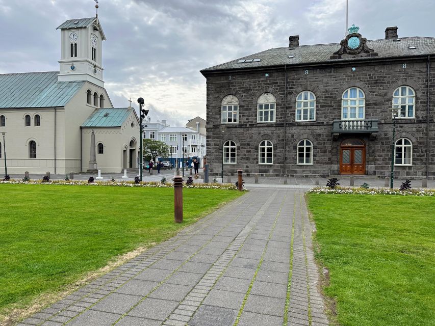 Reykjavik: City Walking tour in Small Group with Local Guide - Harpa’s glass interior and the oceanfront walk