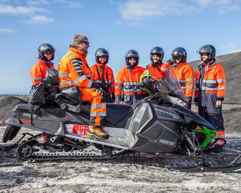 Reykjavik: Iceland South Coast & Glacier Snowmobile Tour - Riding the modified glacier truck uphill