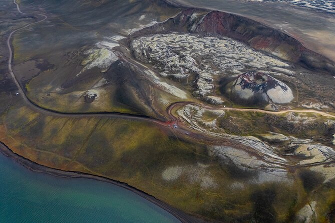 Reykjavík: Landmannalaugar & Icelandic Highlands Super Jeep Tour - Hjálparfoss, a small waterfall with a useful story