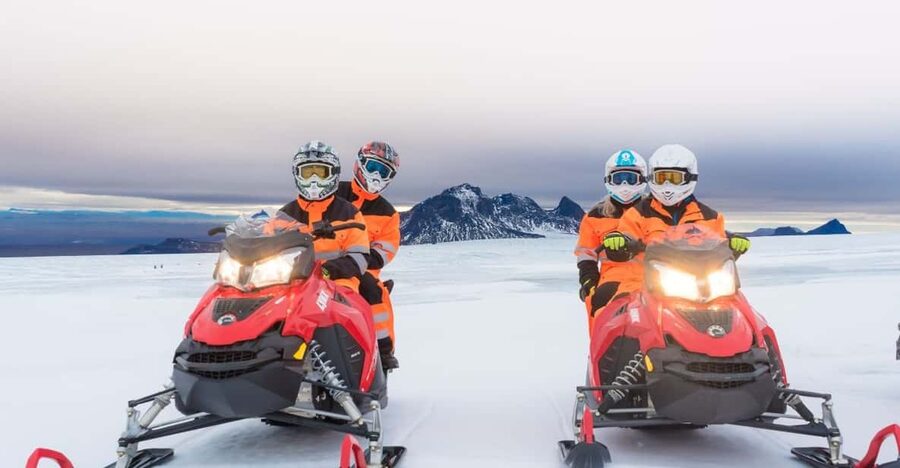Reykjavík: Langjökull Glacier Snowmobile Tour with Ice Cave - Getting geared up for the snowmobile