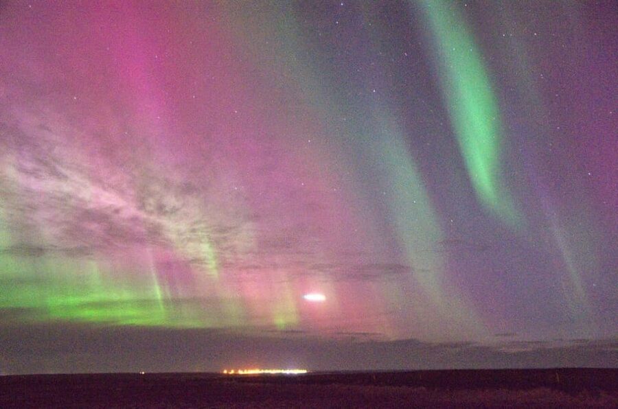 Reykjavík: New Year's Eve Northern Lights Yacht Cruise - Moving close to shore for midnight