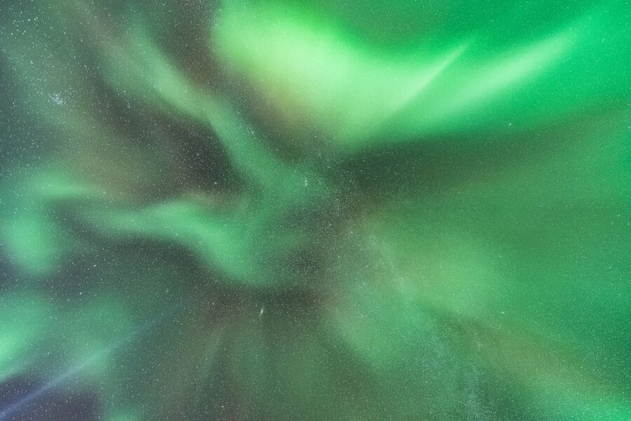 Reykjavik: Northern Lights Group Tour with Photos - Waiting in the cold for a natural show