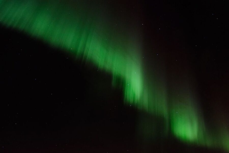 Reykjavik: Northern Lights Motor Yacht Cruise - Indoor warmth, outdoor views, and photography