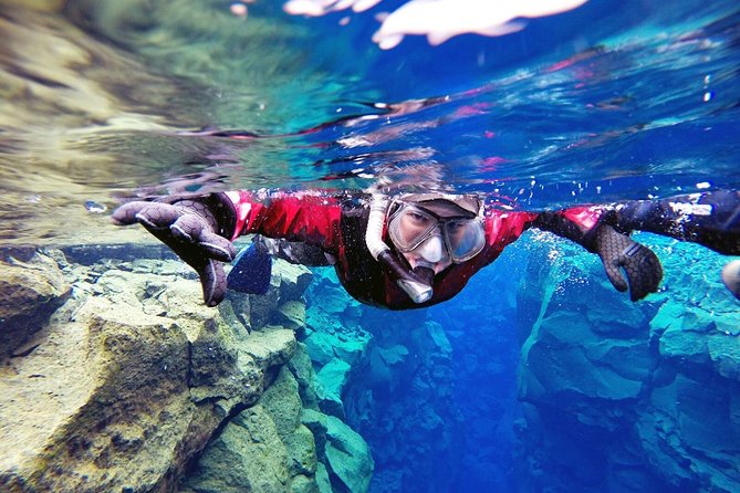 Silfra Drysuit Snorkeling Tour with Free Photos - From Reykjavik - Thirty to forty minutes between volcanic walls