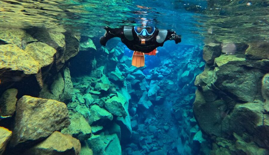 Silfra: Fissure Snorkeling Tour with Underwater Photos - Getting into the dry suit