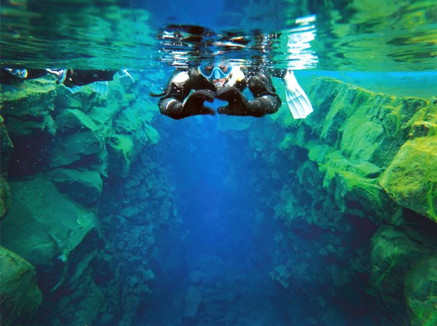 Silfra: Fissure Snorkeling Tour with Underwater Photos - The three-hour schedule, from parking lot to water