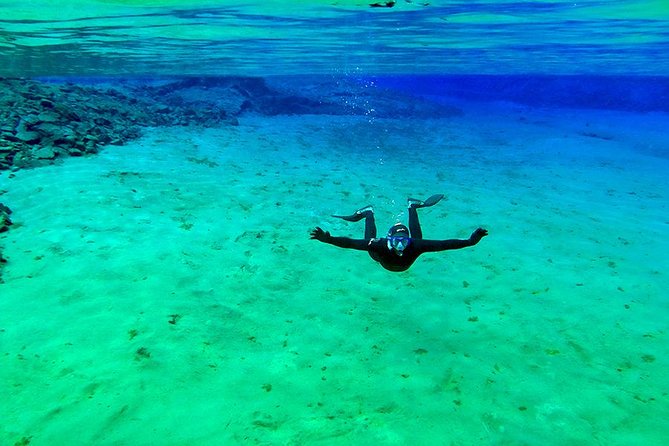 Silfra Wetsuit Snorkeling - Meet on Location | Free Photos - Entering the fissure with a PADI guide
