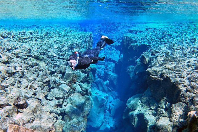 Silfra Wetsuit Snorkeling Tour with Underwater Photos - From Reykjavik - Forty minutes in a clear glacial fissure