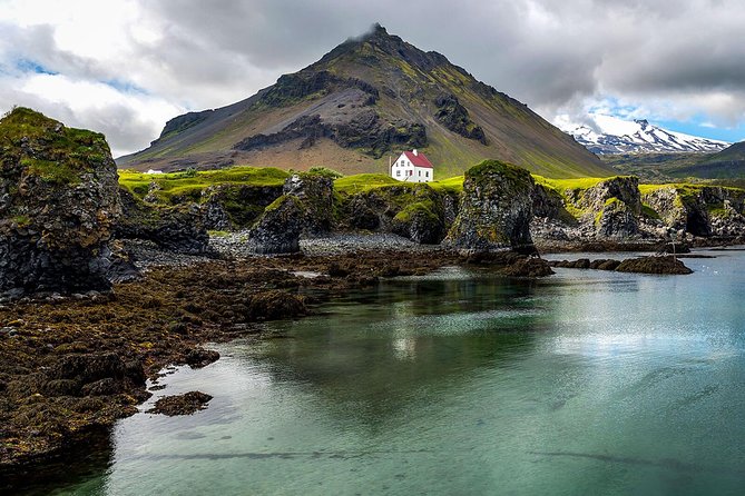 Snaefellsnes National Park and Natural Wonders from Reykjavik - Lóndrangar, volcanic rock above the sea