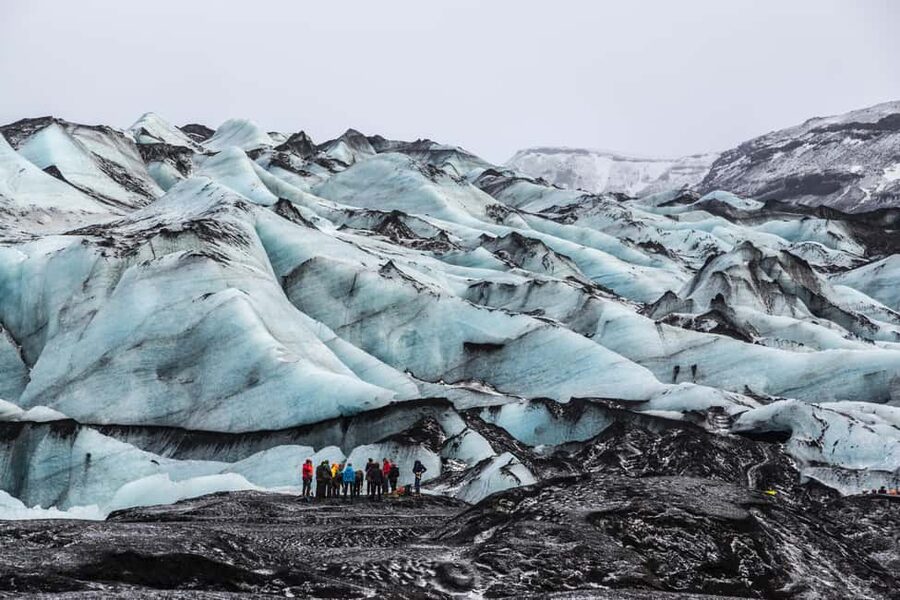 South Coast, Glacier Hike and Northern Lights Winter Tour - Walking across Sólheimajökull