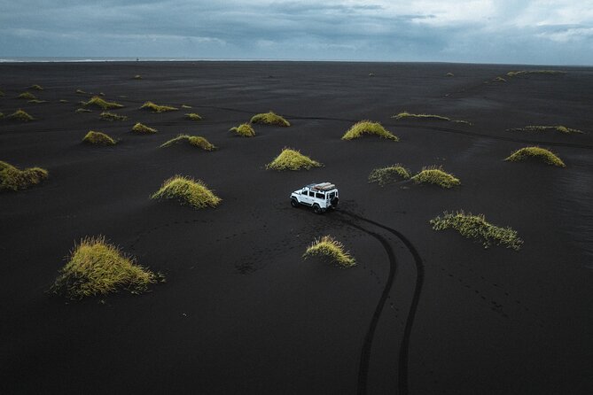 South Coast | Private Tour | PRO Photo Package included - Reynisfjara: beautiful black sand with a real safety warning
