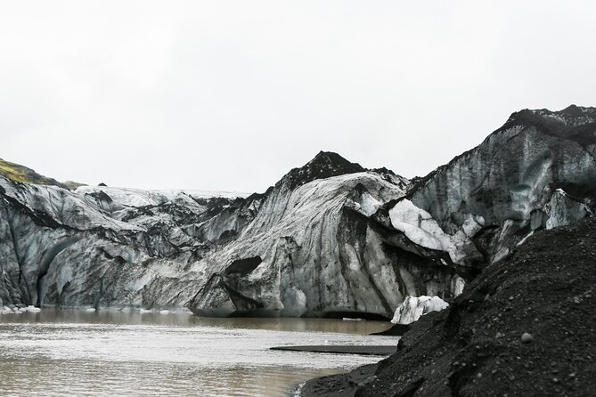 South Coast Tour Private Epic Adventure - Sólheimajökull shows Iceland’s ice up close